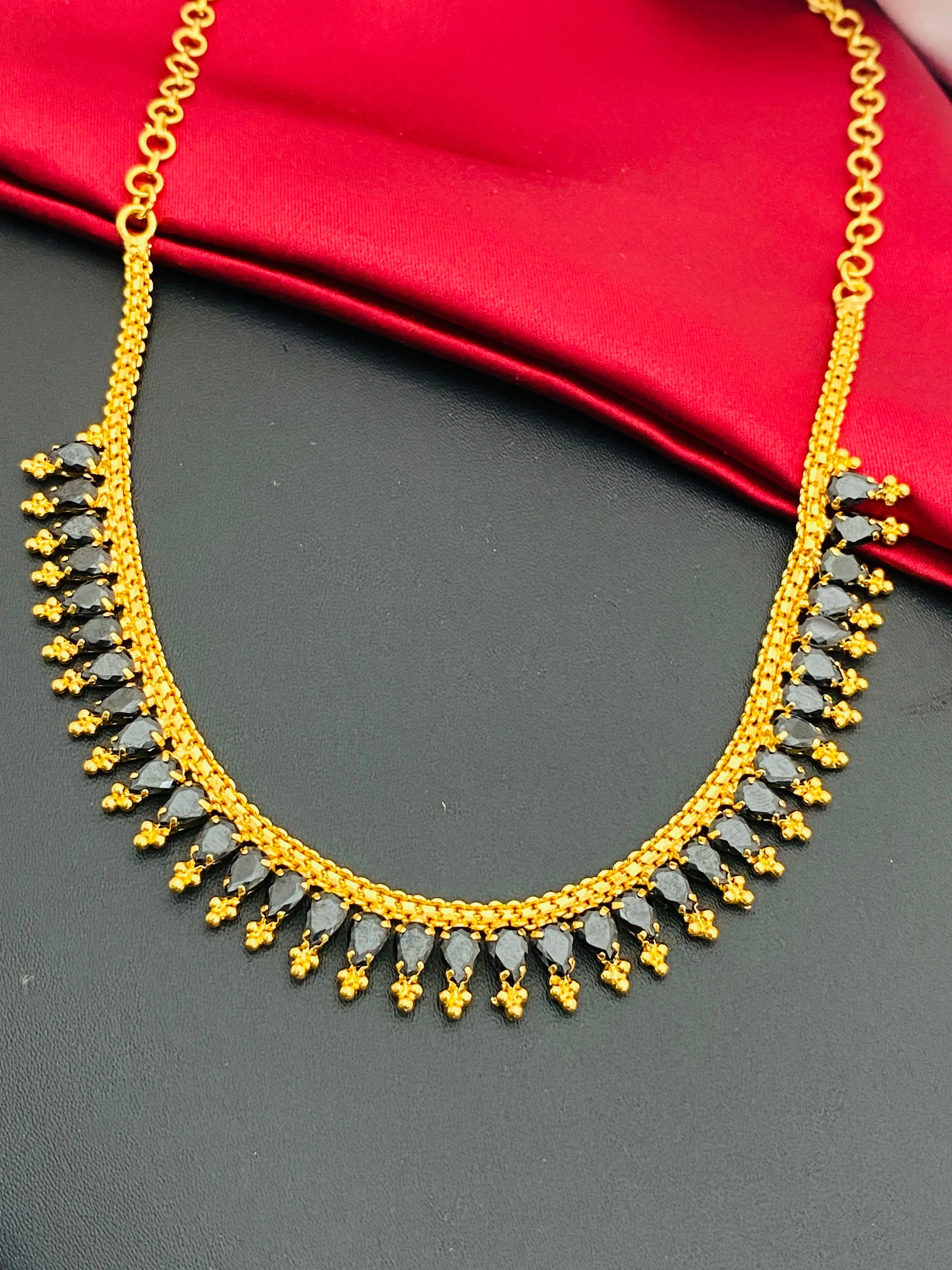 Lovely Ethnic Wear Gold Plated Necklace With Premium Black Stones