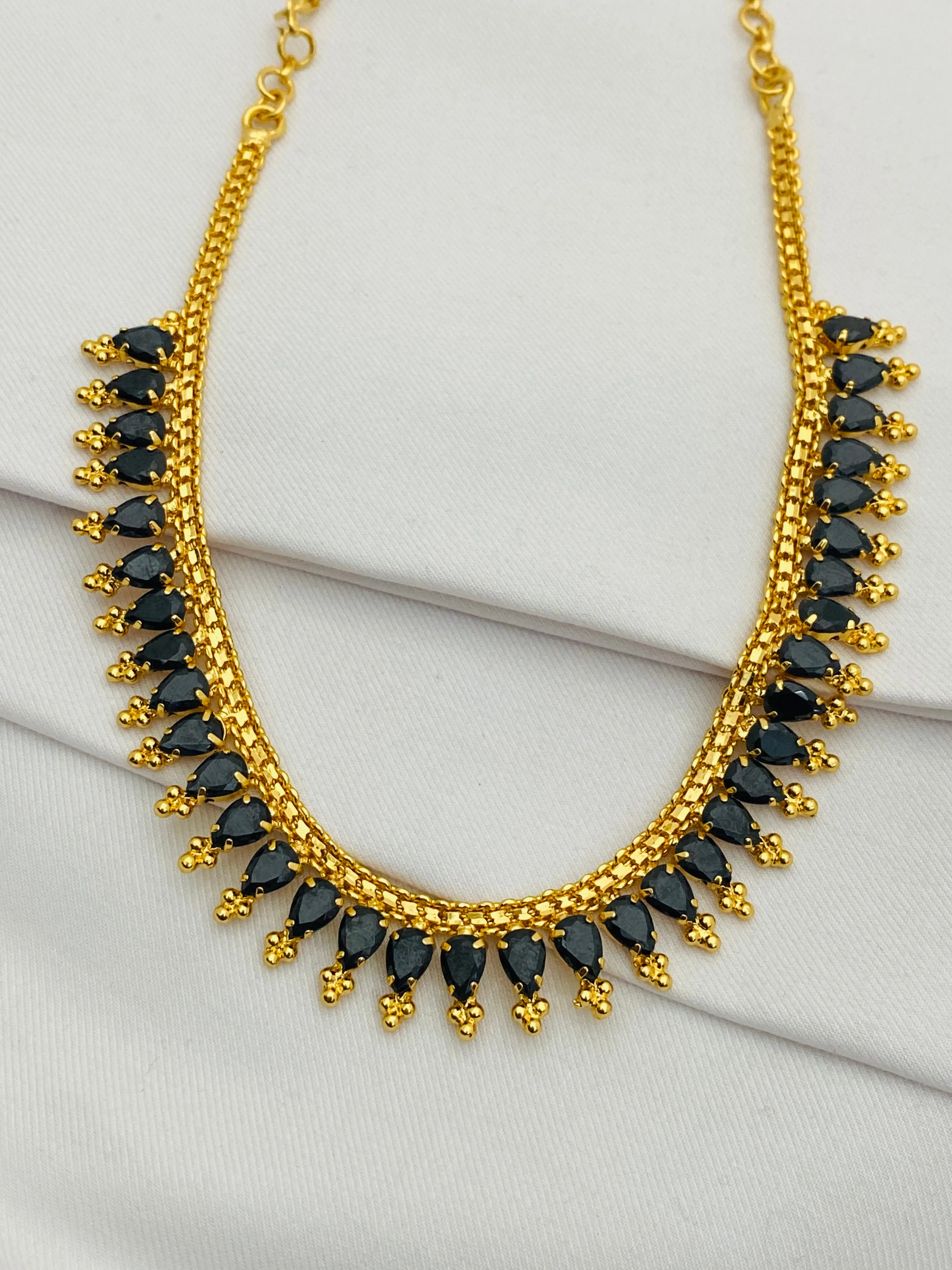 Lovely Ethnic Wear Gold Plated Necklace With Premium Black Stones