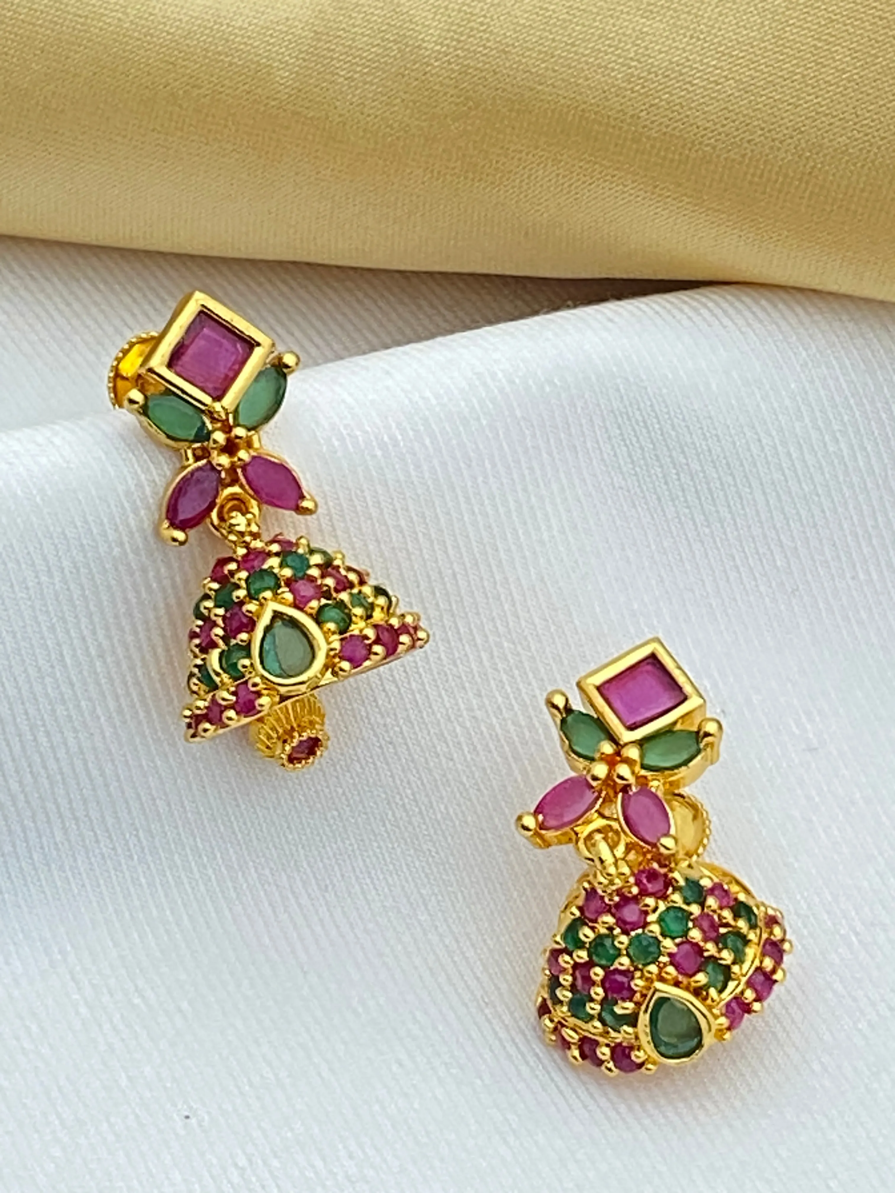 Stunning Gold Plated Ruby And Emerald Traditional Wear Jhumka Earrings For Wedding